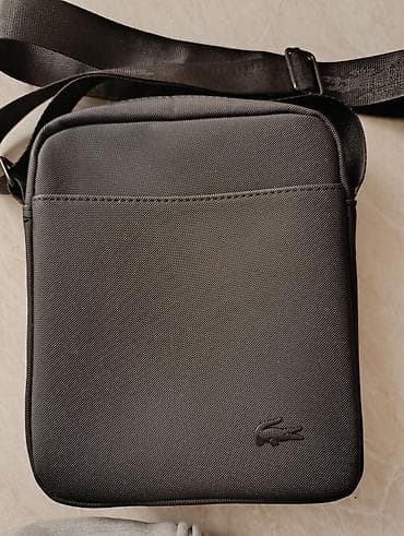 Барсетка, Материал: Комбинированный материал, Застежка на молнии, Множество карманов, Моющийся материал, Б/у at lalafo.kg — 1 Барсетка, Материал: Комбинированный материал, Застежка на молнии, Множество карманов, Моющийся материал, Б/у — 1