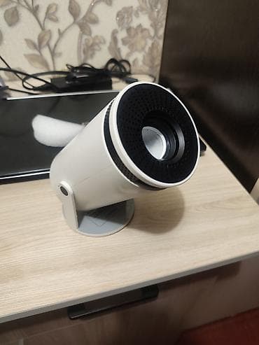 Другое ТВ и видео: Смарт‑проектор в цилиндрическом корпусе на поворотной подставке at lalafo.kg — 1 Другое ТВ и видео: Смарт‑проектор в цилиндрическом корпусе на поворотной подставке — 1