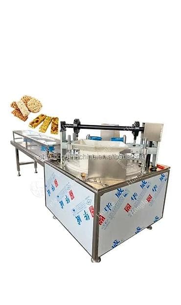 Линия по производству и упаковке кунжутно‑арахисовых at lalafo.kg Линия по производству и упаковке кунжутно‑арахисовых