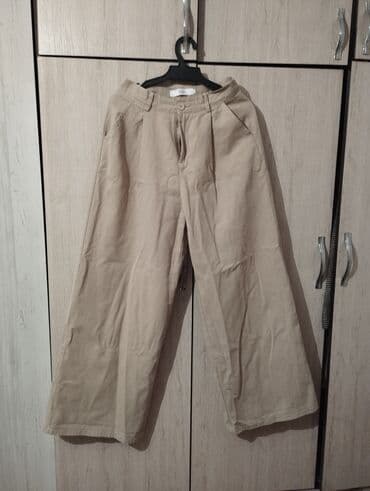 Брюки женские, широкие, бежевые (бежево‑песочный оттенок). - Посадка at lalafo.kg Брюки женские, широкие, бежевые (бежево‑песочный оттенок). - Посадка