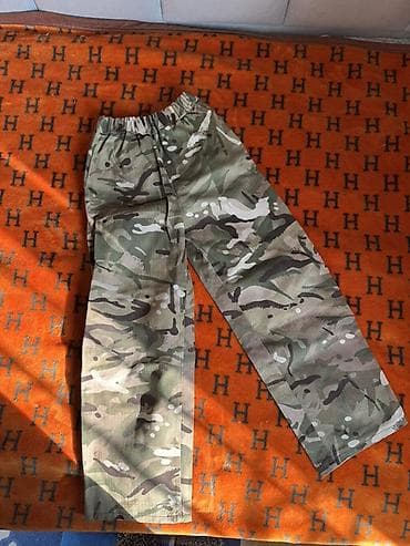Детские брюки с камуфляжным принтом - Принт: мультикам at lalafo.kg Детские брюки с камуфляжным принтом - Принт: мультикам