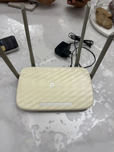 TP-Link Archer A5 (AC1200) — двухдиапазонный Wi‑Fi роутер с четырьмя at lalafo.kg TP-Link Archer A5 (AC1200) — двухдиапазонный Wi‑Fi роутер с четырьмя