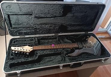 Кофр от (или для) гитары Шектер. Без проблем помещается любой at lalafo.kg Кофр от (или для) гитары Шектер. Без проблем помещается любой