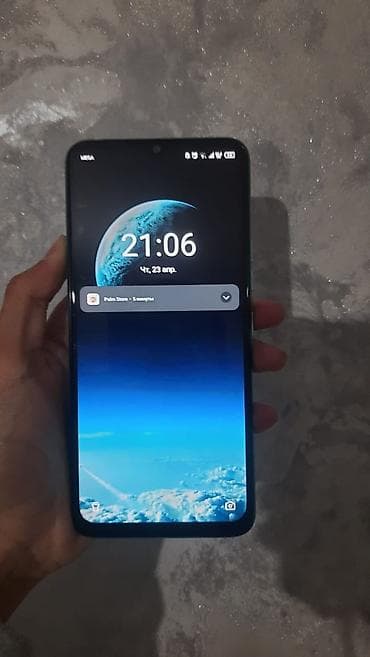 Смартфон в бирюзовом цвете с фактурной задней крышкой «ромбы». Экран с at lalafo.kg Смартфон в бирюзовом цвете с фактурной задней крышкой «ромбы». Экран с