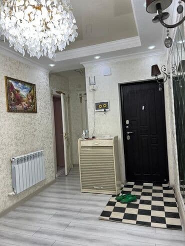 Элегантная люстра с каскадными хрустальными подвесками, выполненная в at lalafo.kg Элегантная люстра с каскадными хрустальными подвесками, выполненная в