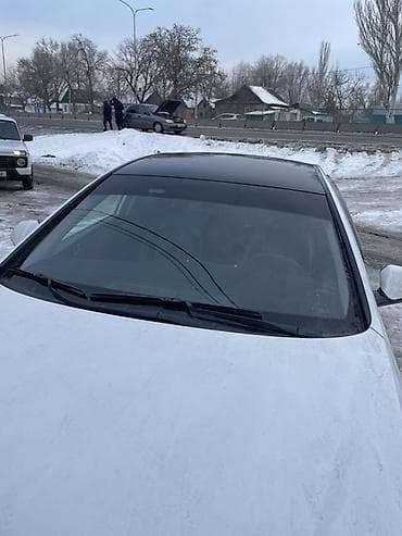 Оклейка крыши автомобиля черной глянцевой пленкой Оклейка черный супер at lalafo.kg Оклейка крыши автомобиля черной глянцевой пленкой Оклейка черный супер