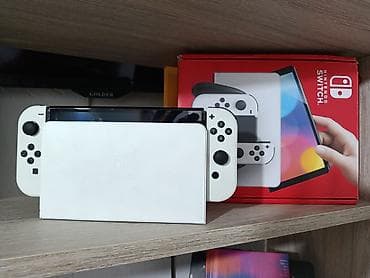 Nintendo Switch OLED (модель 2021) – белая версия. Абсолютно новая at lalafo.kg Nintendo Switch OLED (модель 2021) – белая версия. Абсолютно новая