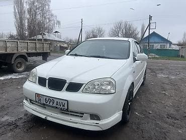 Daewoo lasetti Белый седан компакт-класса. Пятидверный кузов с at lalafo.kg Daewoo lasetti Белый седан компакт-класса. Пятидверный кузов с