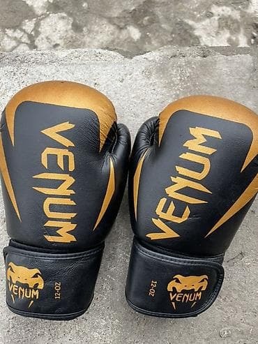 Боксерские перчатки Venum, 12 oz. - Цвет: черно‑золотой с фирменными at lalafo.kg Боксерские перчатки Venum, 12 oz. - Цвет: черно‑золотой с фирменными