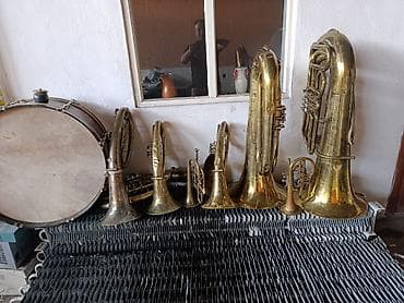 Коллекция духовых музыкальных инструментов + большой барабан Состав at lalafo.kg Коллекция духовых музыкальных инструментов + большой барабан Состав