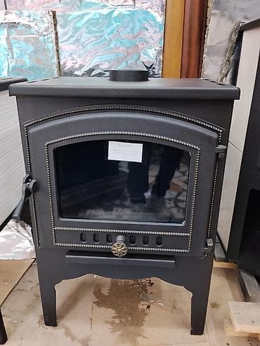 Дровяная печь-камин из чугуна/стали с панорамным термостойким стеклом at lalafo.kg Дровяная печь-камин из чугуна/стали с панорамным термостойким стеклом