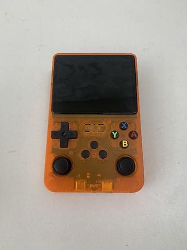 Портативная ретро‑приставка Game Console R36S (оранжевый прозрачный lalafo.kg да Портативная ретро‑приставка Game Console R36S (оранжевый прозрачный