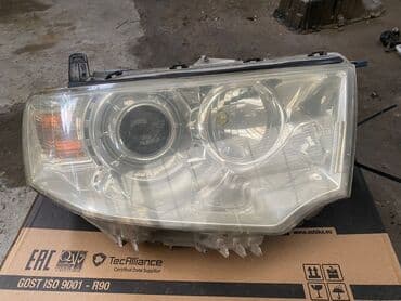 Передняя левая фара Mitsubishi 2012 г., Б/у, Оригинал, Япония at lalafo.kg Передняя левая фара Mitsubishi 2012 г., Б/у, Оригинал, Япония