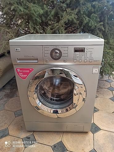 Стиральная машина LG с фронтальной загрузкой, серебристый корпус at lalafo.kg Стиральная машина LG с фронтальной загрузкой, серебристый корпус