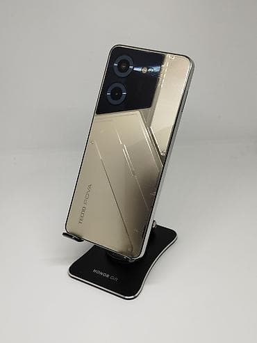 Tecno Pova 5, Б/у, 256 ГБ, цвет - Золотой, 2 SIM at lalafo.kg Tecno Pova 5, Б/у, 256 ГБ, цвет - Золотой, 2 SIM