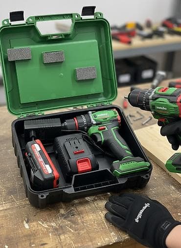 Шуруповёрт Дрели Metabo, представленный в прочном зеленом кейсе. Кейс at lalafo.kg Шуруповёрт Дрели Metabo, представленный в прочном зеленом кейсе. Кейс