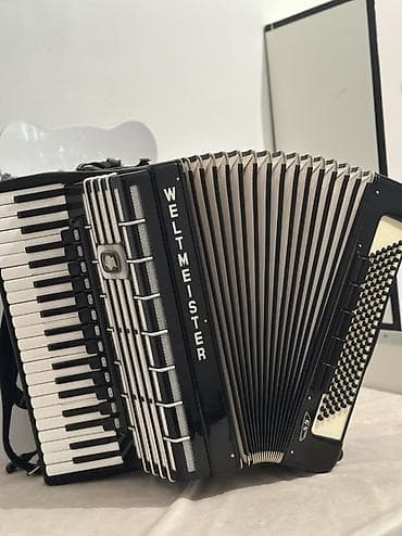 Аккордеон Weltmeister - Клавиатурный аккордеон, черный глянцевый at lalafo.kg Аккордеон Weltmeister - Клавиатурный аккордеон, черный глянцевый