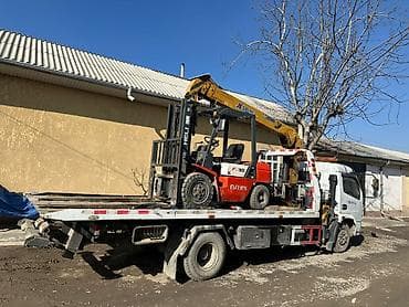 Эвакуатор-манипулятор для перевозки спецтехники и авто - at lalafo.kg Эвакуатор-манипулятор для перевозки спецтехники и авто -