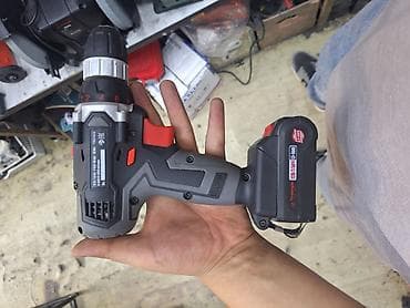 Универсальная аккумуляторная дрель-шуруповерт в серо-черном корпусе с at lalafo.kg Универсальная аккумуляторная дрель-шуруповерт в серо-черном корпусе с