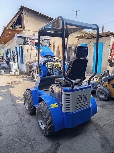 Компактный фронтальный мини‑погрузчик с ковшом - Четырёхколёсный at lalafo.kg Компактный фронтальный мини‑погрузчик с ковшом - Четырёхколёсный