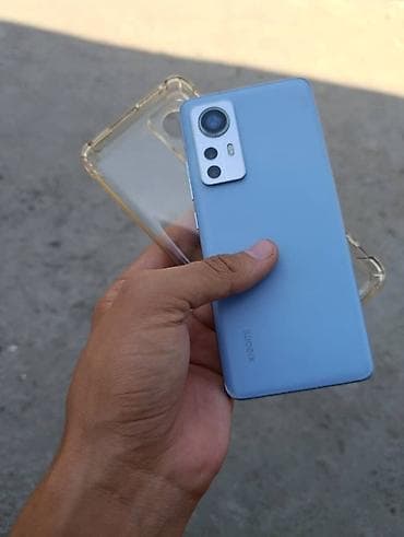 Смартфон Xiaomi 12 Х(голубой) + прозрачный силиконовый чехол в at lalafo.kg Смартфон Xiaomi 12 Х(голубой) + прозрачный силиконовый чехол в