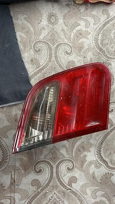 Задний фонарь автомобиля (левый/правый уточняется по форме на фото) at lalafo.kg Задний фонарь автомобиля (левый/правый уточняется по форме на фото)