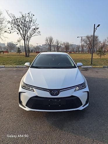 Toyota Corolla: 2023 г., 1.8 л, Автомат, Гибрид, Седан at lalafo.kg Toyota Corolla: 2023 г., 1.8 л, Автомат, Гибрид, Седан