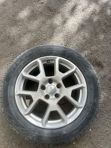 Диск с шиной 215 60 17для Jeep. - Литой оригинальный диск Jeep lalafo.kg да Диск с шиной 215 60 17для Jeep. - Литой оригинальный диск Jeep