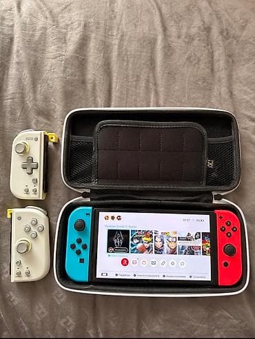 Портативная игровая консоль Nintendo Switch OLED с большим и ярким at lalafo.kg Портативная игровая консоль Nintendo Switch OLED с большим и ярким