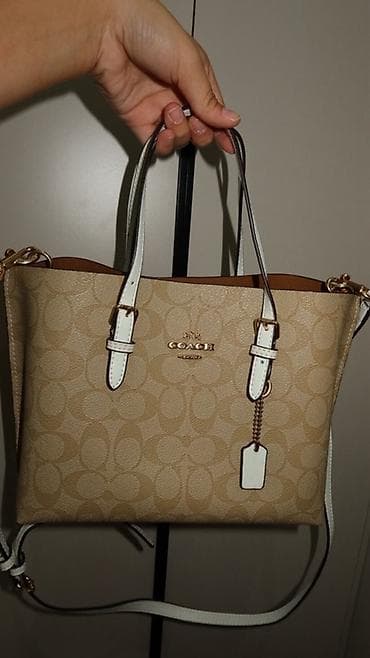 Сумка Coach Signature Canvas Tote (малый формат) - Материал at lalafo.kg Сумка Coach Signature Canvas Tote (малый формат) - Материал