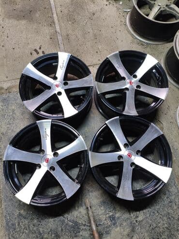 Литые Диски R 15 Volkswagen, Комплект, отверстий - 4, Б/у at lalafo.kg Литые Диски R 15 Volkswagen, Комплект, отверстий - 4, Б/у