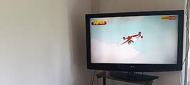 Телевизор LG с плоским экраном, диагональ примерно 32–37" at lalafo.kg Телевизор LG с плоским экраном, диагональ примерно 32–37"